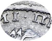 Деталь монеты полтина 1722 года  год цифрами, точка
