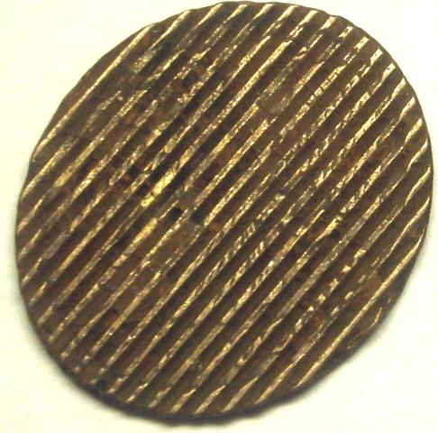 Рис. 2. Гашеная монета ММД (до 1997 г.)