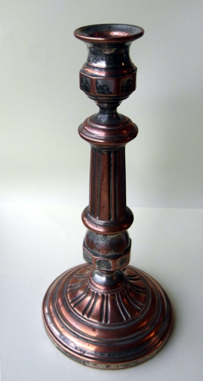 A silverplated candlestick made by Norblin and Co in 1848