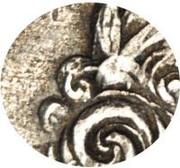 Деталь монеты полтина 1704 года МД два локона
