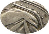 Деталь монеты полтина 1712 года  дата справа от орла